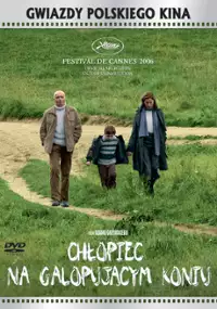 Chłopiec na galopującym koniu
